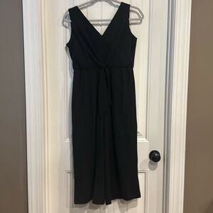 Women’s black jumpsuit.